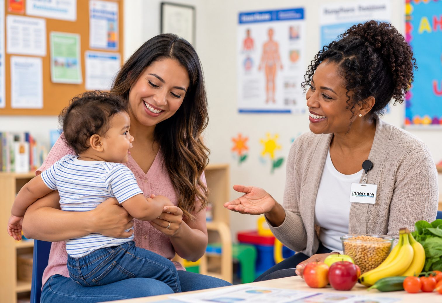 A WIC counselor talks with a smiling mother holding her baby, with fresh fruits and vegetables on the table.